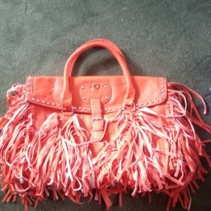 Large orange fringe handbag